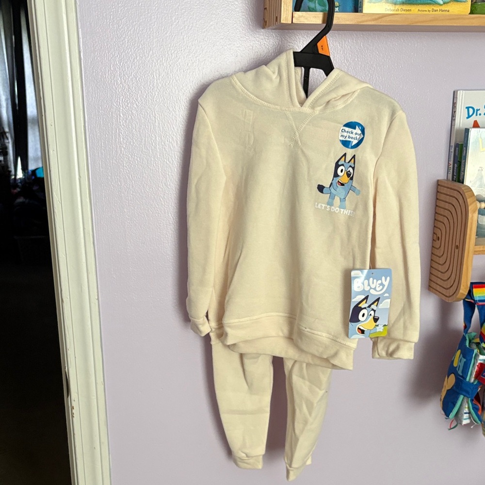 Cream Colored Jogging Suit with Blue 'Bluey' Graphic